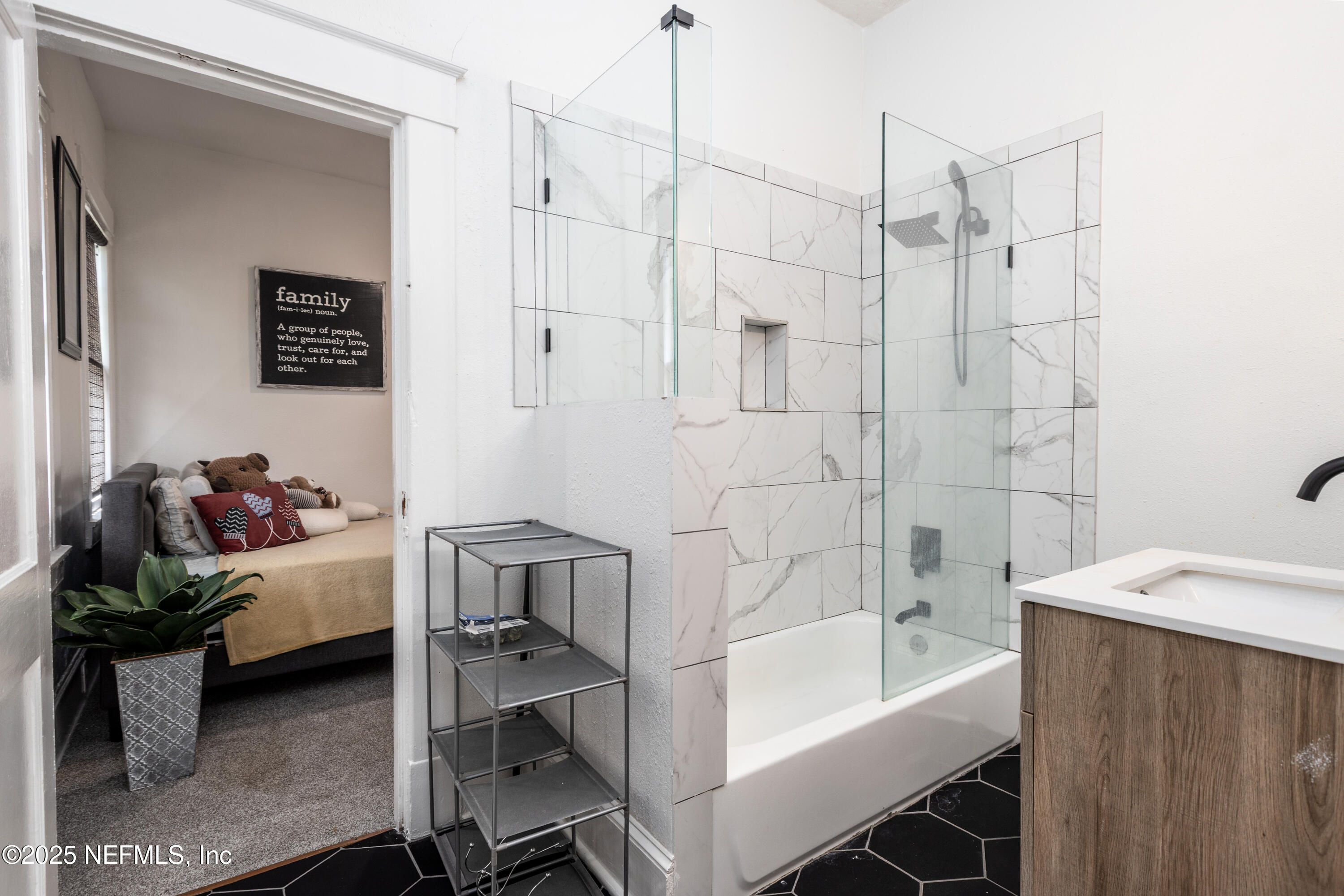 2068 Redwing Street Jacksonville, FL 32206 - Photo 7 of 26 a bathroom with a bathtub sink and toilet