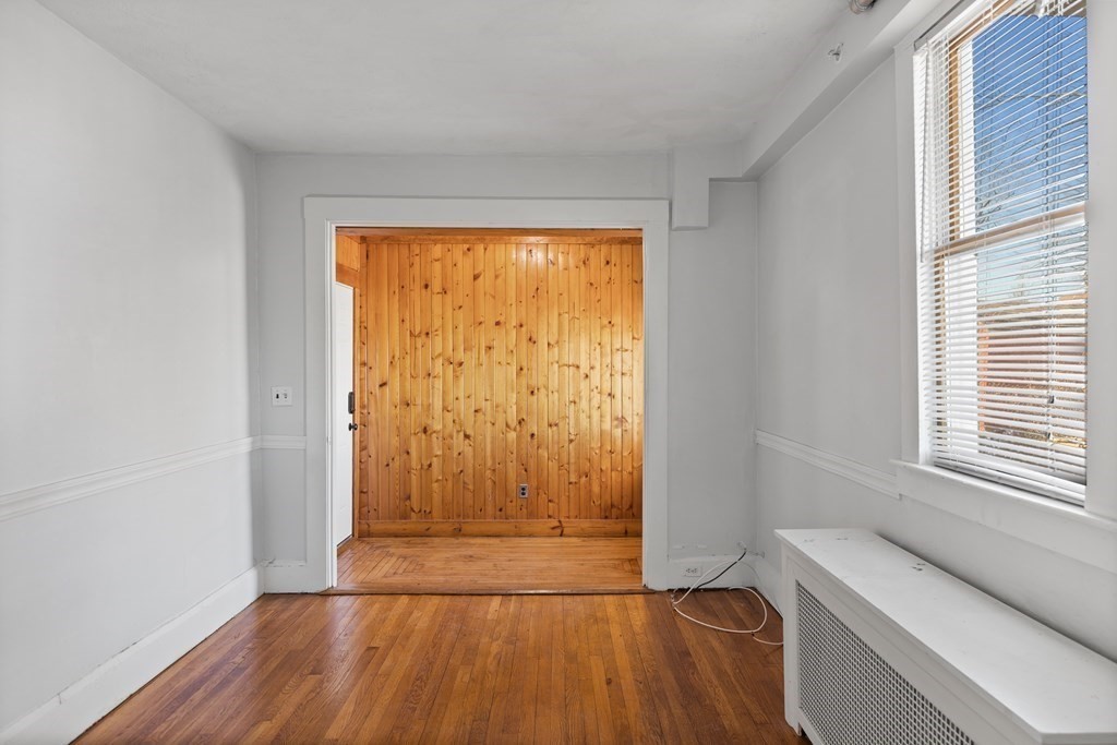 198 Harris Street, Unit 1 Revere, MA 02151 - Photo 3 of 9 a view of a room with wooden floor and a window