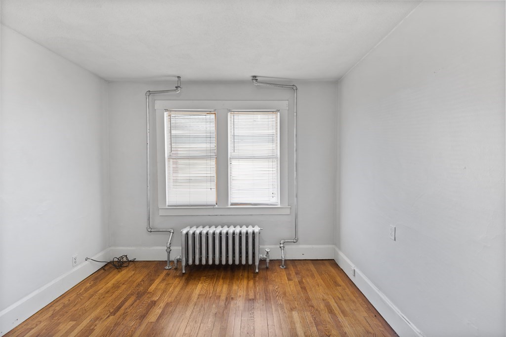 198 Harris Street, Unit 1 Revere, MA 02151 - Photo 7 of 9 an empty room with a window