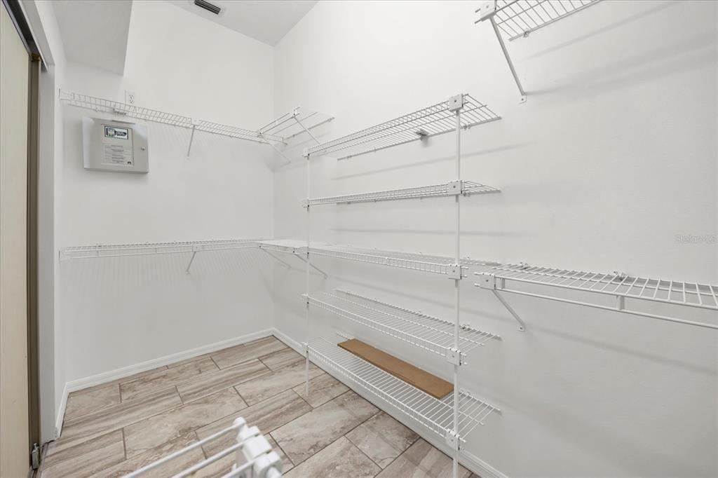 220 Wimbledon Circle Lake Mary, FL 32746 - Photo 20 of 38 a view of a room with racks on the wall