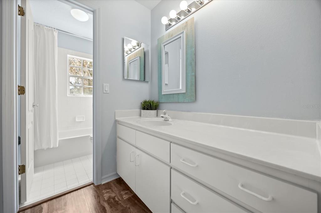 220 Wimbledon Circle Lake Mary, FL 32746 - Photo 26 of 38 a bathroom with a sink and a mirror