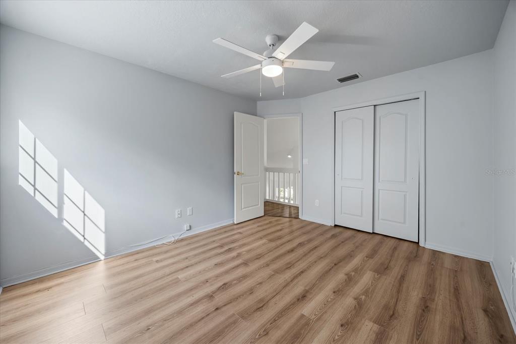220 Wimbledon Circle Lake Mary, FL 32746 - Photo 28 of 38 a view of an empty room with wooden floor