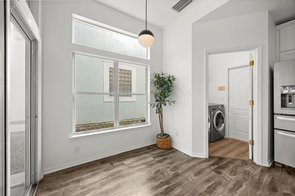 220 Wimbledon Circle Lake Mary, FL 32746 - Photo 32 of 38 a view of a storage and utility room with a window