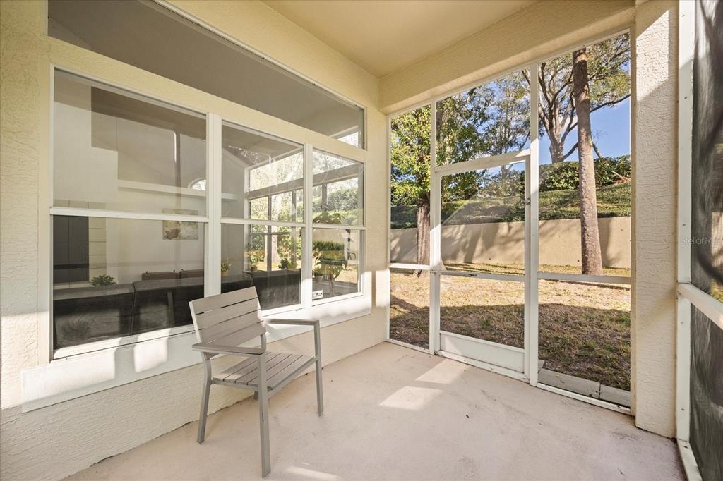 220 Wimbledon Circle Lake Mary, FL 32746 - Photo 34 of 38 a living room with large windows