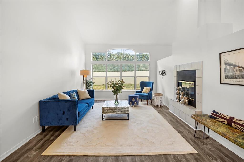 220 Wimbledon Circle Lake Mary, FL 32746 - Photo 9 of 38 a living room with furniture and a window