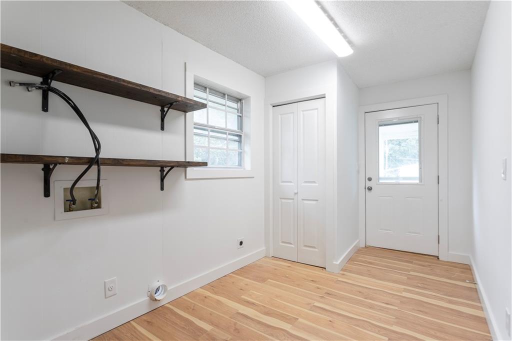 4361 Ben Hill Road Lithia Springs, GA 30122 - Photo 19 of 35 a view of a room with empty racks