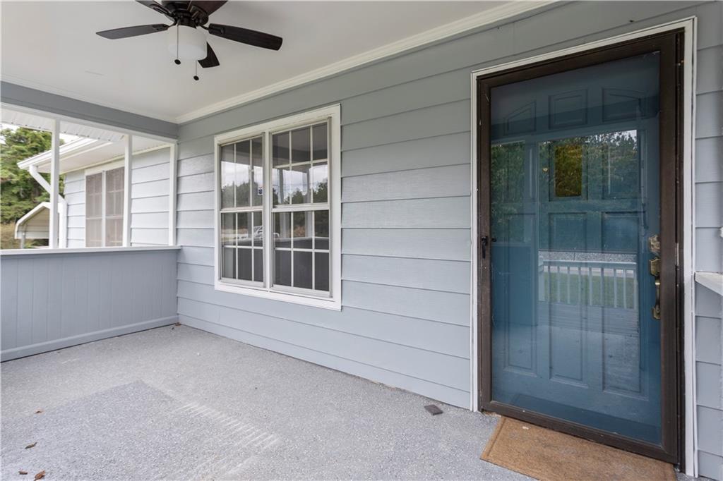 4361 Ben Hill Road Lithia Springs, GA 30122 - Photo 8 of 35 a view of an empty room with a window