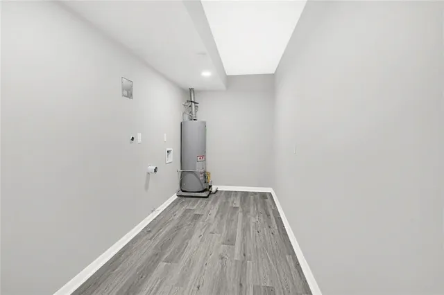 a view of wooden floor in a bathroom
