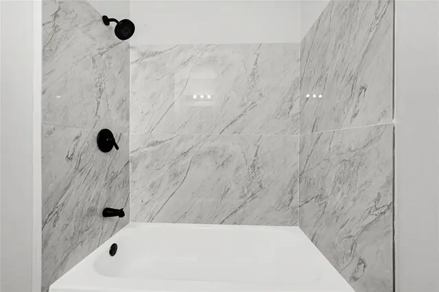 a bathroom with a bathtub