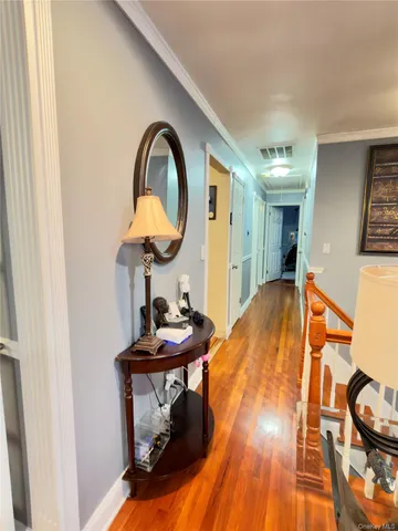 a bed room with a bed and a television