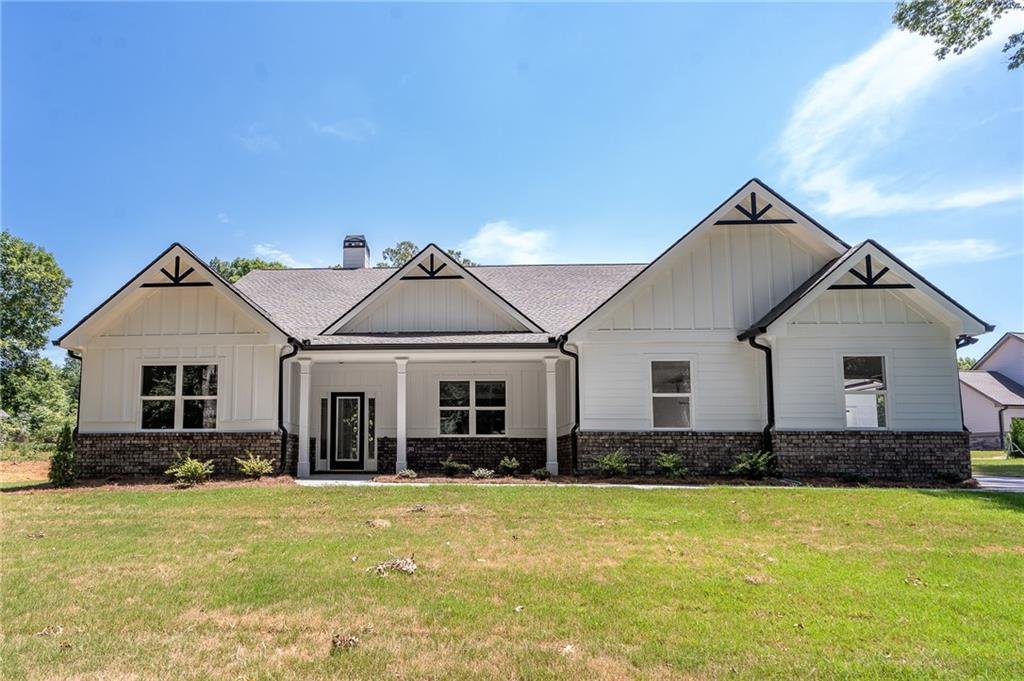 7269 Brockton Road Nicholson, GA 30565 - Photo 1 of 1 a front view of a house with a yard