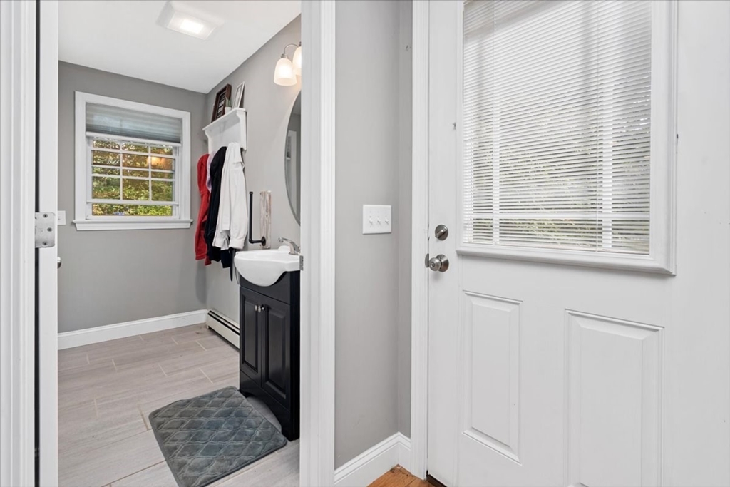 61 Blake Road Epping, NH 03042 - Photo 19 of 41 a view of walk in closet with clothes and shoes