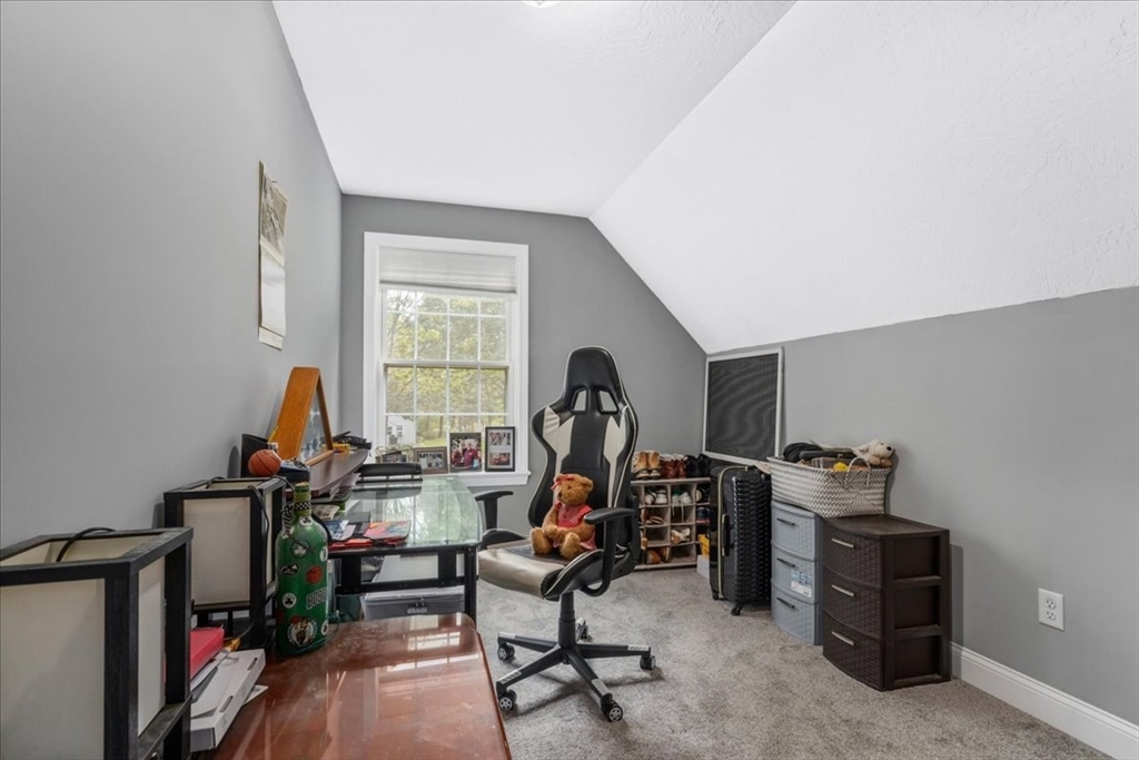 61 Blake Road Epping, NH 03042 - Photo 33 of 41 a view of a workspace with furniture and a window