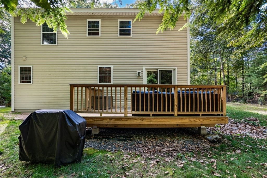 61 Blake Road Epping, NH 03042 - Photo 35 of 41 a view of a deck with a yard