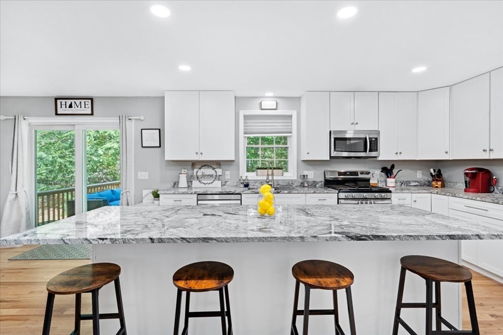 61 Blake Road Epping, NH 03042 - Photo 8 of 41 a kitchen with lots of counter top space and appliances