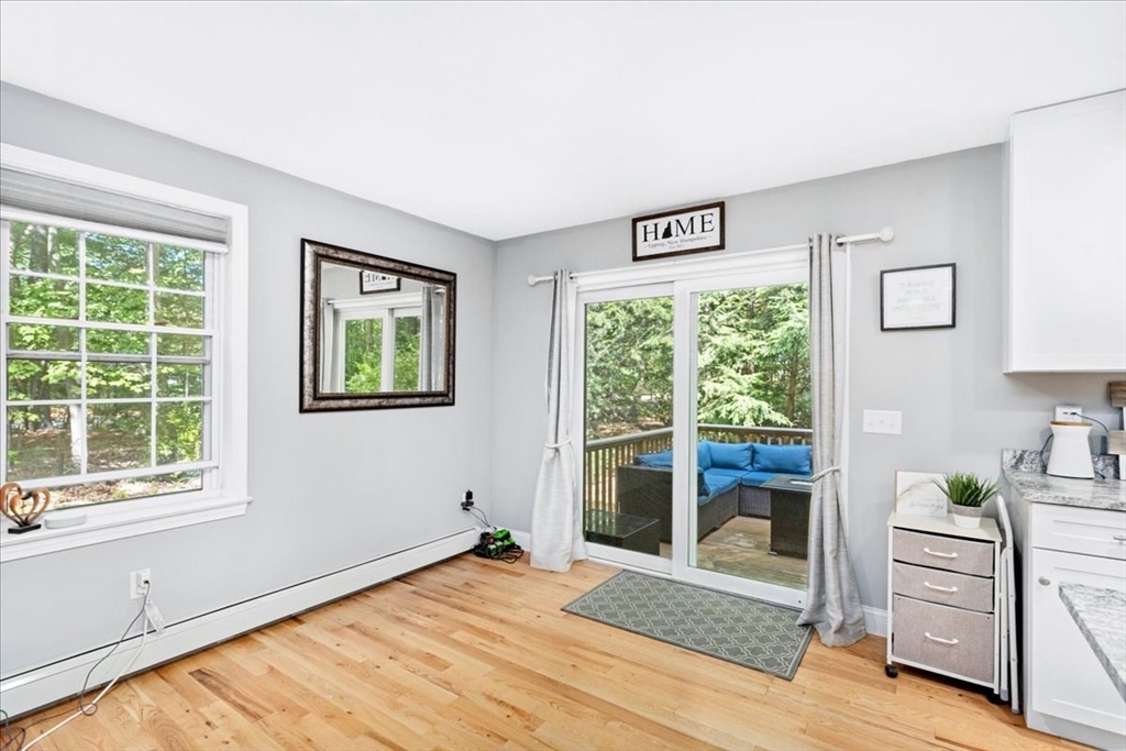 61 Blake Road Epping, NH 03042 - Photo 10 of 41 a view of a livingroom with an empty space and a window