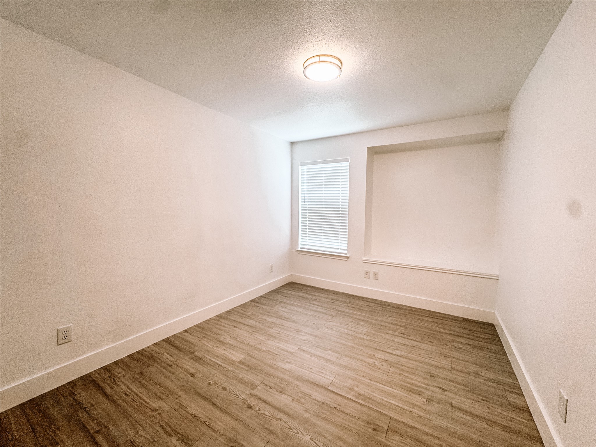 12524 Pebblestone Street Houston, TX 77072 - Photo 14 of 16 wooden floor in a room
