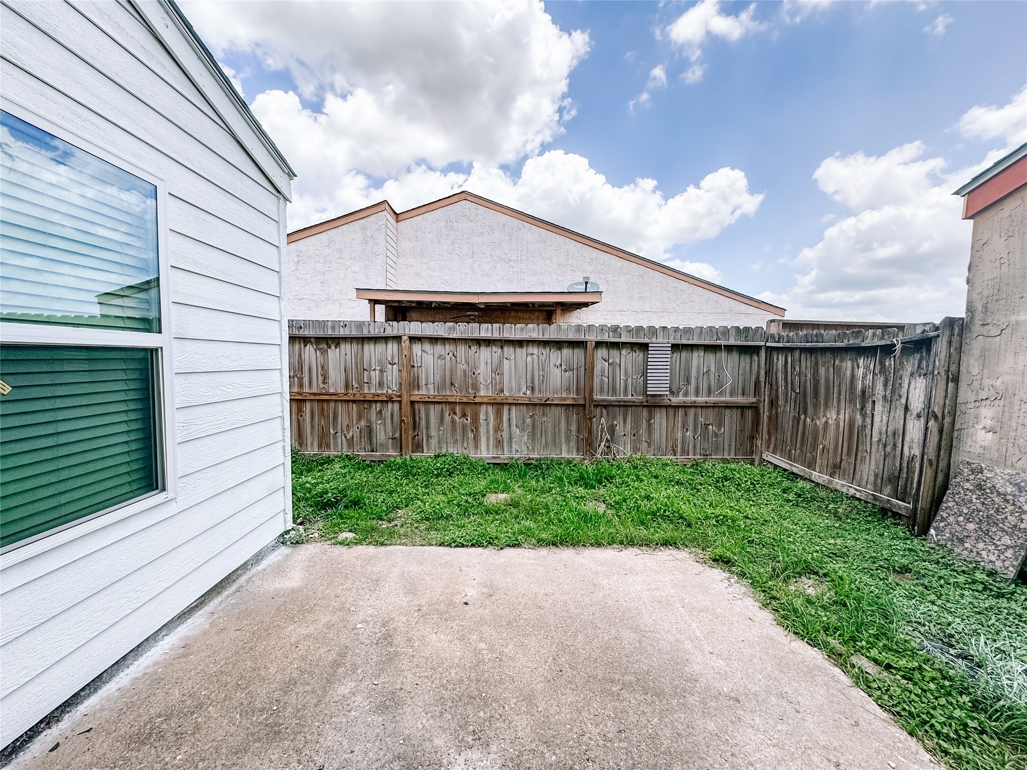 12524 Pebblestone Street Houston, TX 77072 - Photo 16 of 16 a view of a backyard with plants