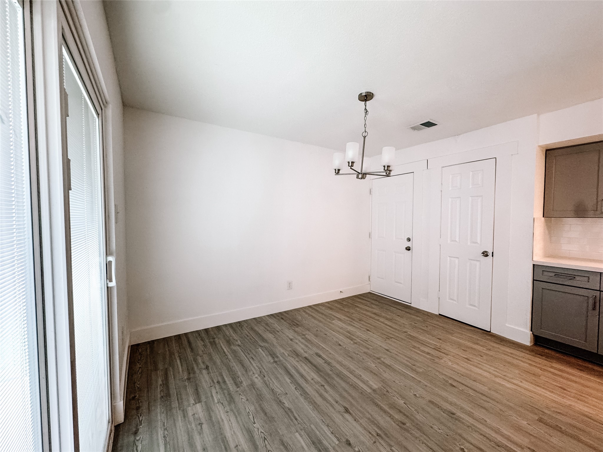 12524 Pebblestone Street Houston, TX 77072 - Photo 5 of 16 wooden floor in an empty room with a window