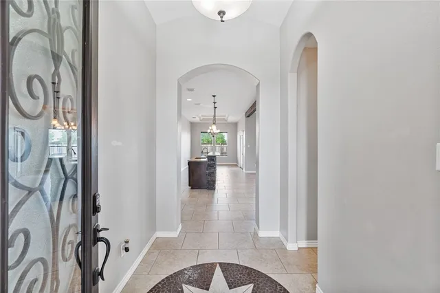 a view of a hallway with entryway