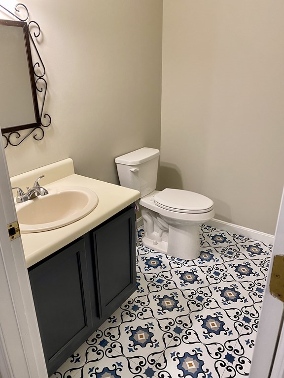 13 May Brook Road, Unit 13 Holland, MA 01521 - Photo 15 of 36 a bathroom with a sink and a toilet