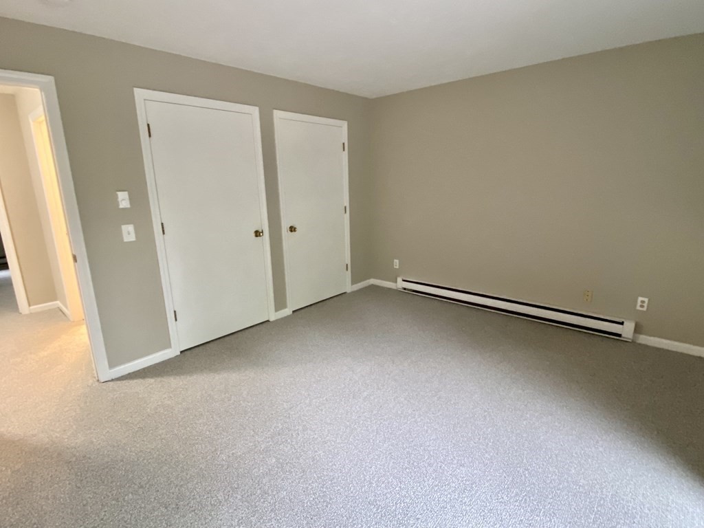 13 May Brook Road, Unit 13 Holland, MA 01521 - Photo 21 of 36 a view of an empty room