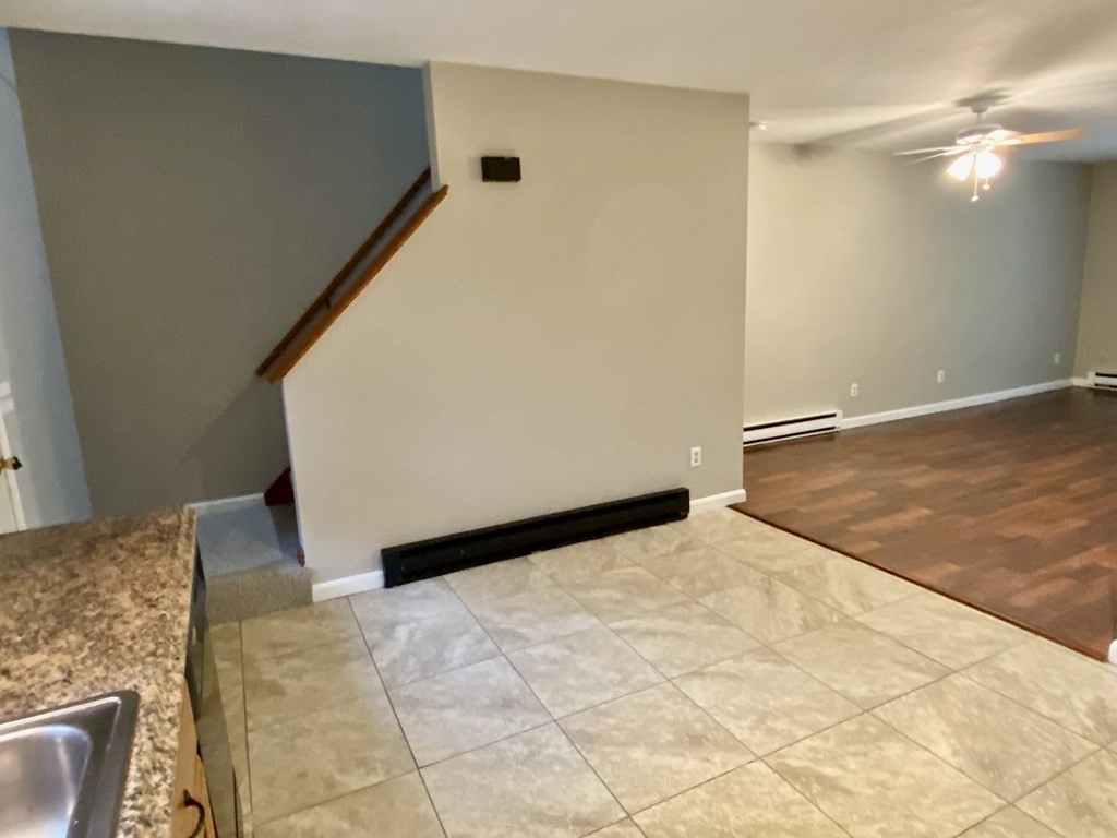 13 May Brook Road, Unit 13 Holland, MA 01521 - Photo 35 of 36 a view of a big room with closet and a chandelier fan