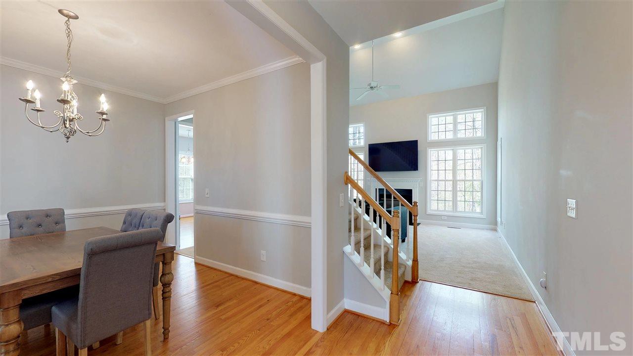 957 Chicken Bridge Road Pittsboro, NC 27312 - Photo 5 of 29 Hardwood in dining, kitchen, and entry
