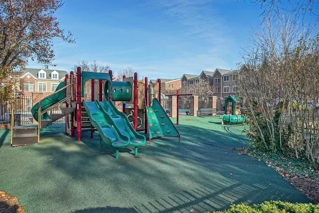 a view of a park with sitting area