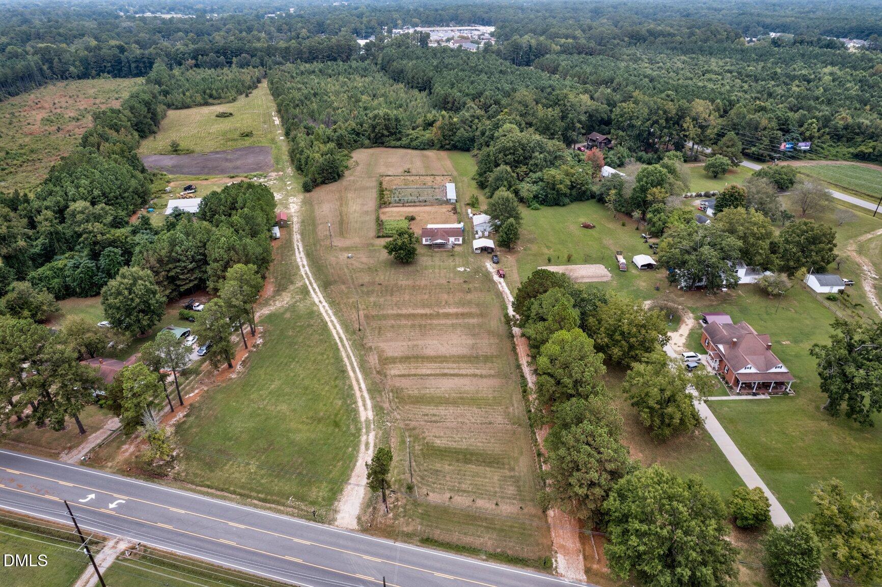 1835 Cokey Road Rocky Mount, NC 27801 - Photo 35 of 42 an aerial view of a house with outdoor space