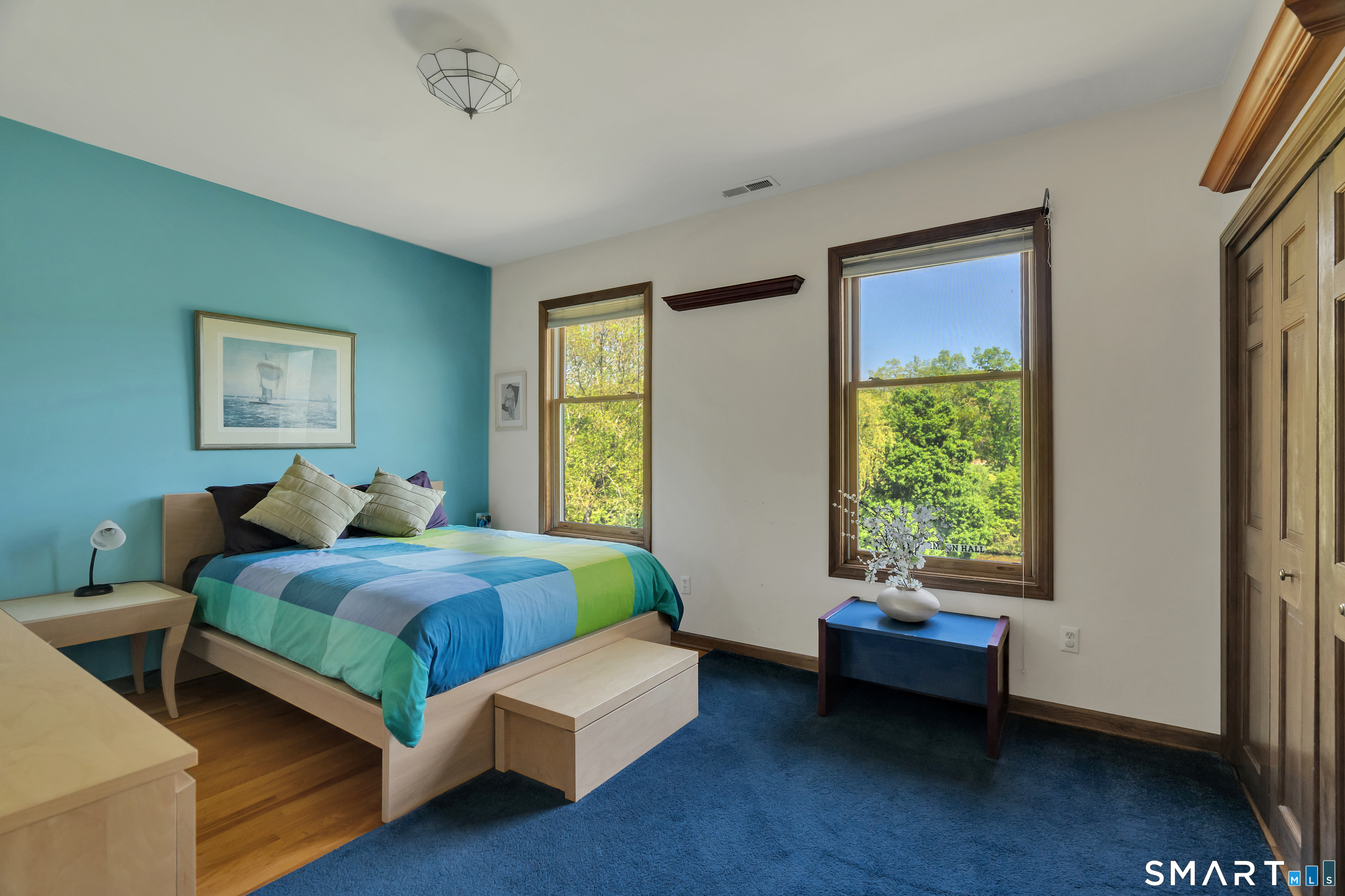 194 Quaker Farms Road Oxford, CT 06478 - Photo 25 of 40 a bedroom with a bed and a window