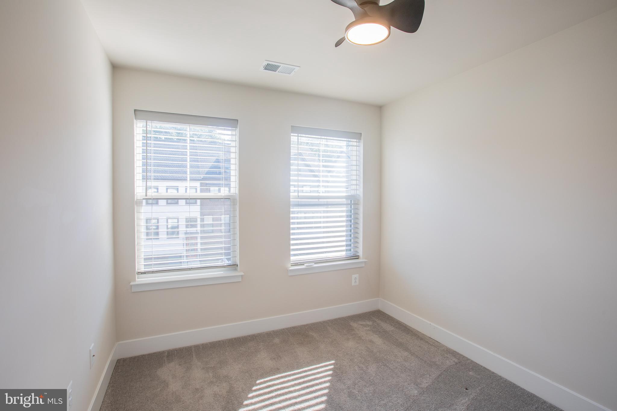 826 Teacher MItchell Road Glen Burnie, MD 21060 - Photo 22 of 41 an empty room with a window