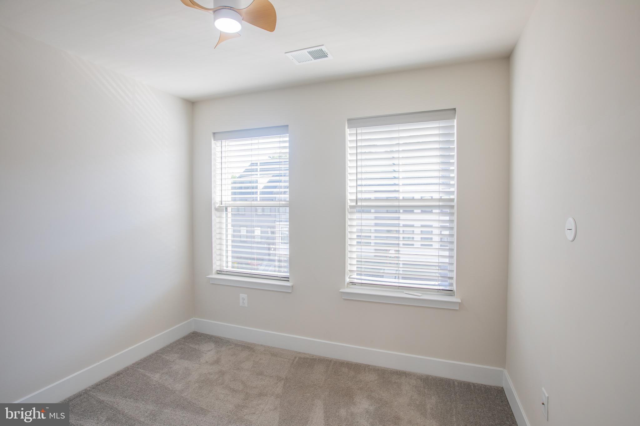 826 Teacher MItchell Road Glen Burnie, MD 21060 - Photo 24 of 41 a view of an empty room with a window