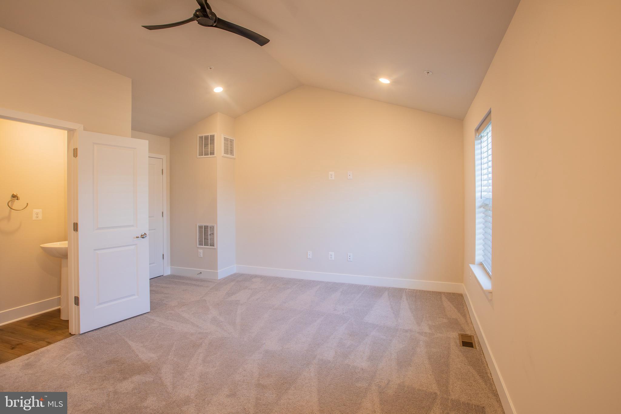 826 Teacher MItchell Road Glen Burnie, MD 21060 - Photo 26 of 41 wooden floor in an empty room with a window