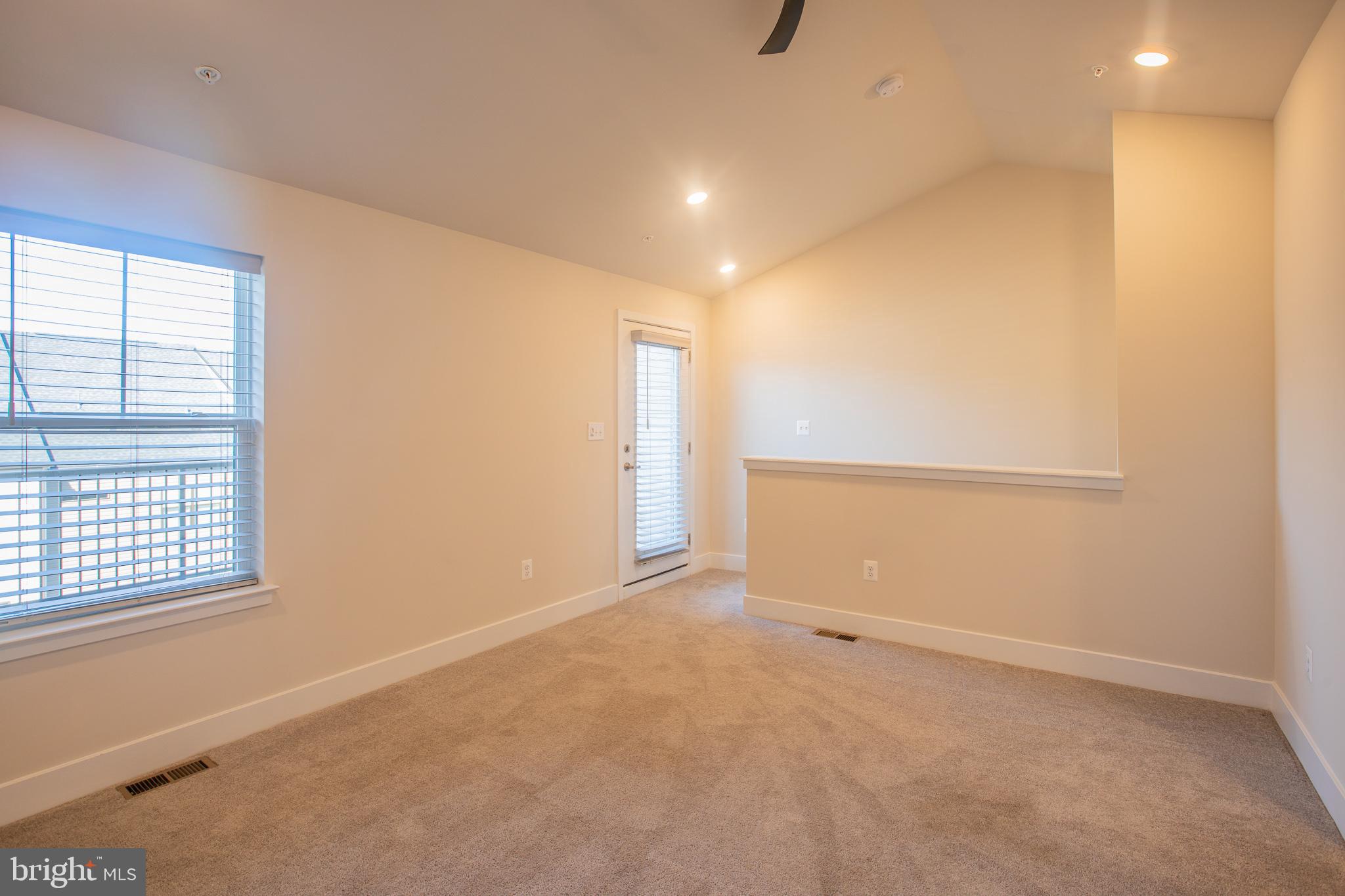 826 Teacher MItchell Road Glen Burnie, MD 21060 - Photo 28 of 41 an empty room with windows