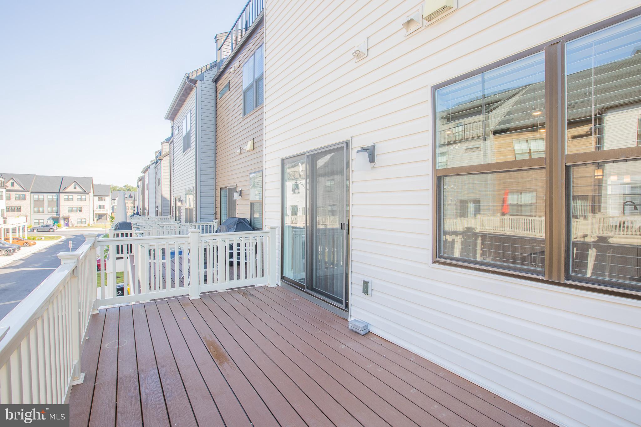 826 Teacher MItchell Road Glen Burnie, MD 21060 - Photo 36 of 41 a view of a balcony with wooden floor