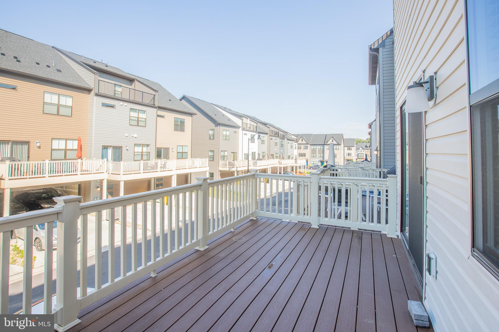 826 Teacher MItchell Road Glen Burnie, MD 21060 - Photo 37 of 41 a view of a balcony with wooden floor