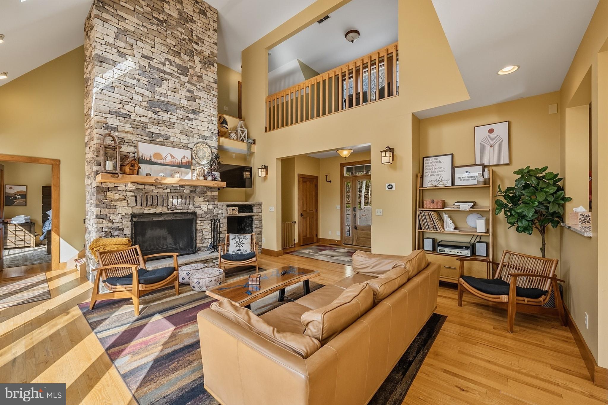 185 Ruta Lane Swanton, MD 21561 - Photo 7 of 81 a living room with furniture and a fireplace