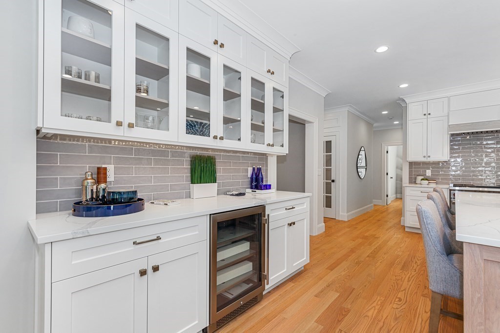37 Woodland Road Lexington, MA 02420 - Photo 11 of 40 a kitchen with stainless steel appliances granite countertop a sink and cabinets