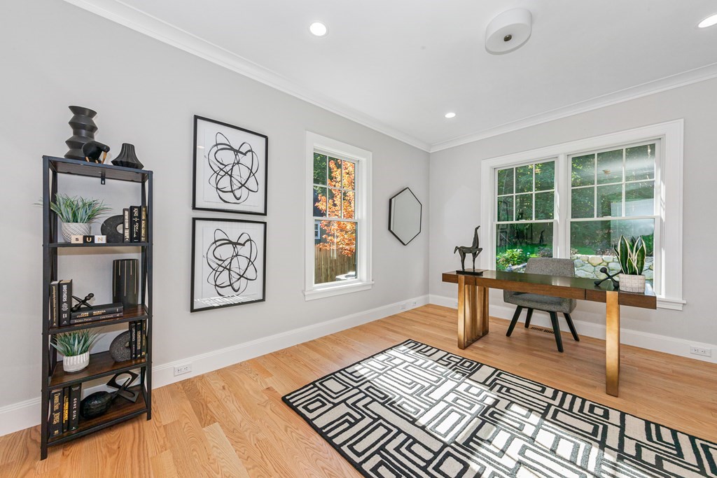 37 Woodland Road Lexington, MA 02420 - Photo 15 of 40 a living room with furniture and a window