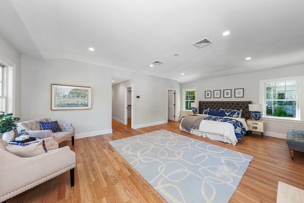 37 Woodland Road Lexington, MA 02420 - Photo 20 of 40 a bedroom with furniture and wooden floor