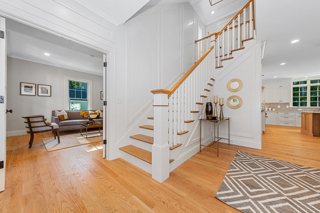 37 Woodland Road Lexington, MA 02420 - Photo 5 of 40 a view of entryway livingroom and hall with wooden floor