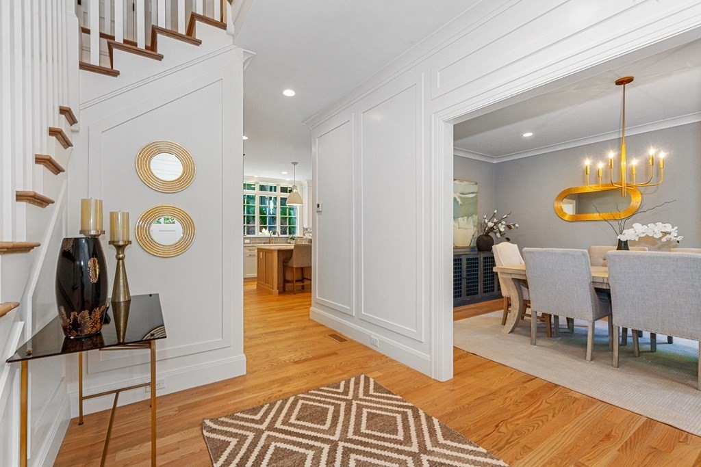 37 Woodland Road Lexington, MA 02420 - Photo 7 of 40 a view of a dining room with furniture