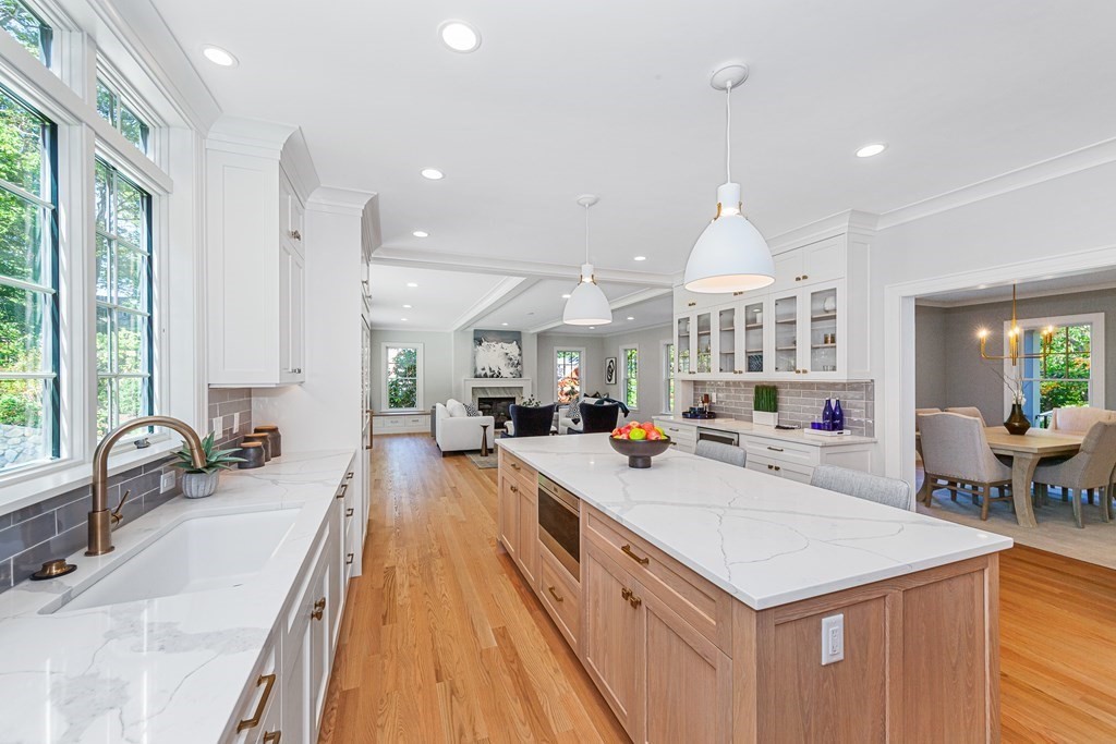 37 Woodland Road Lexington, MA 02420 - Photo 10 of 40 a large white kitchen with a large window