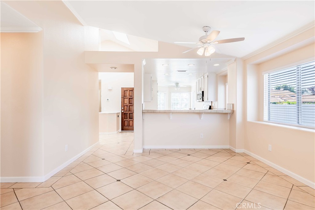 40048 Villa Venecia Temecula, CA 92591 - Photo 13 of 36 a view of a kitchen with wooden floor and windows