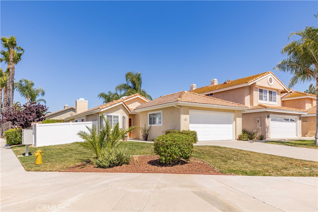 40048 Villa Venecia Temecula, CA 92591 - Photo 2 of 36 front view of a house with a yard