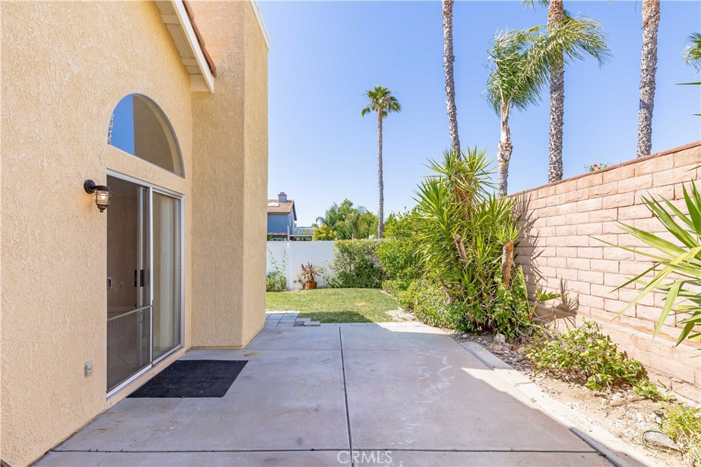 40048 Villa Venecia Temecula, CA 92591 - Photo 22 of 36 a view of a garden with a pathway