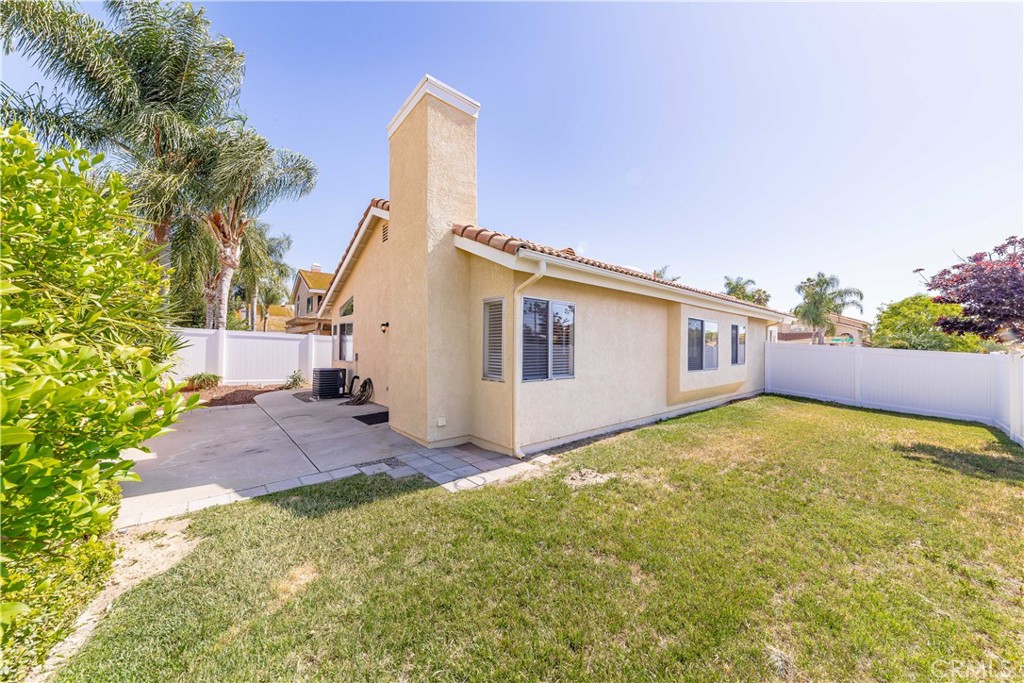 40048 Villa Venecia Temecula, CA 92591 - Photo 24 of 36 a view of a house with backyard and tree