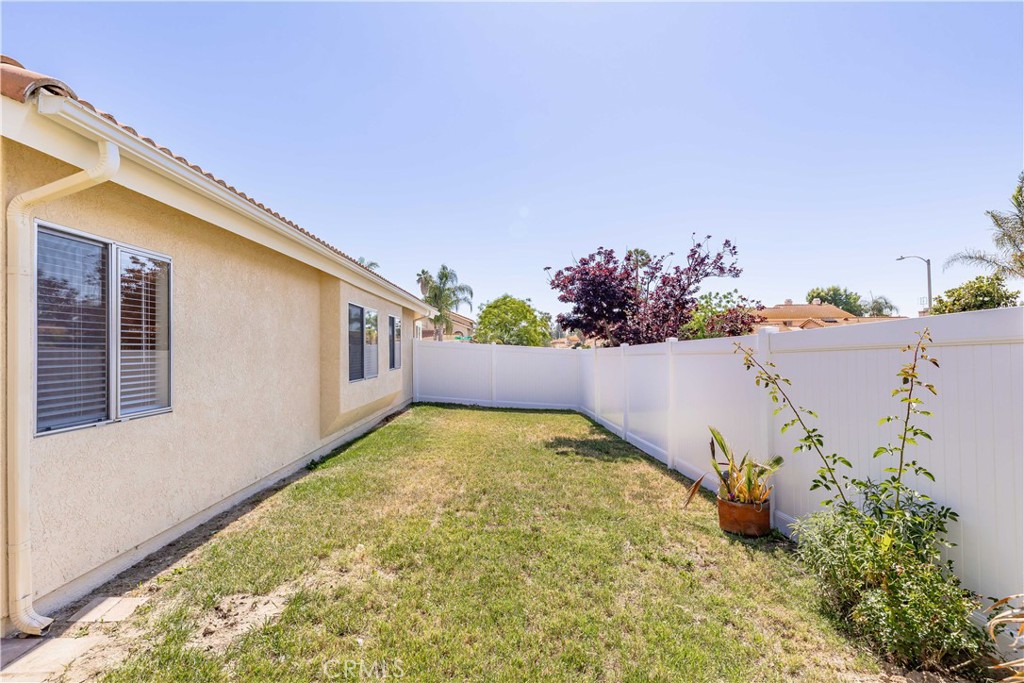 40048 Villa Venecia Temecula, CA 92591 - Photo 25 of 36 a view of backyard with potted plants