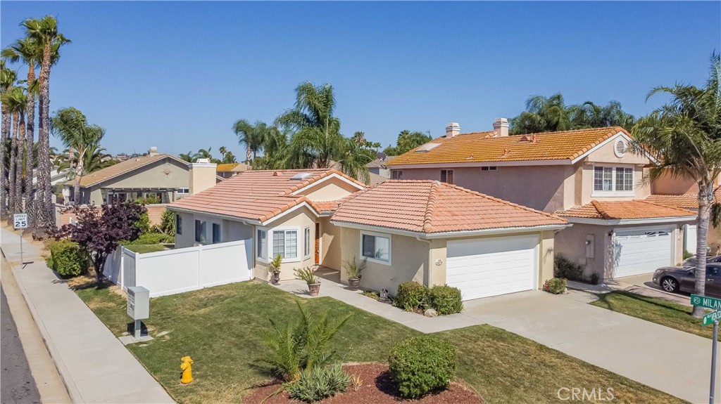 40048 Villa Venecia Temecula, CA 92591 - Photo 27 of 36 a front view of a house with garden